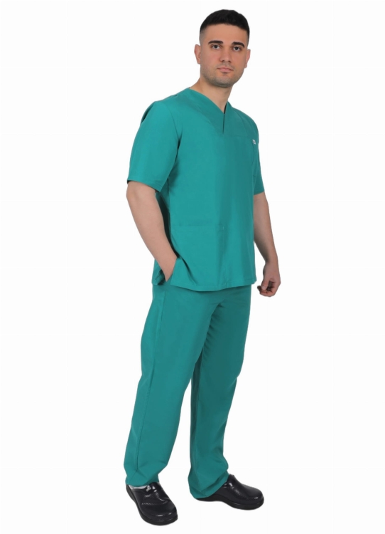 Męskie spodnie medyczne w kolorze zielonym.